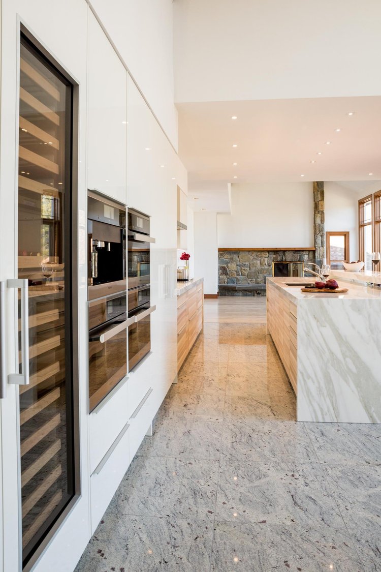 Built-in wine storage and marble kitchen island